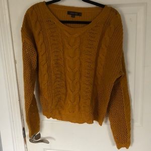 dark orange sweater